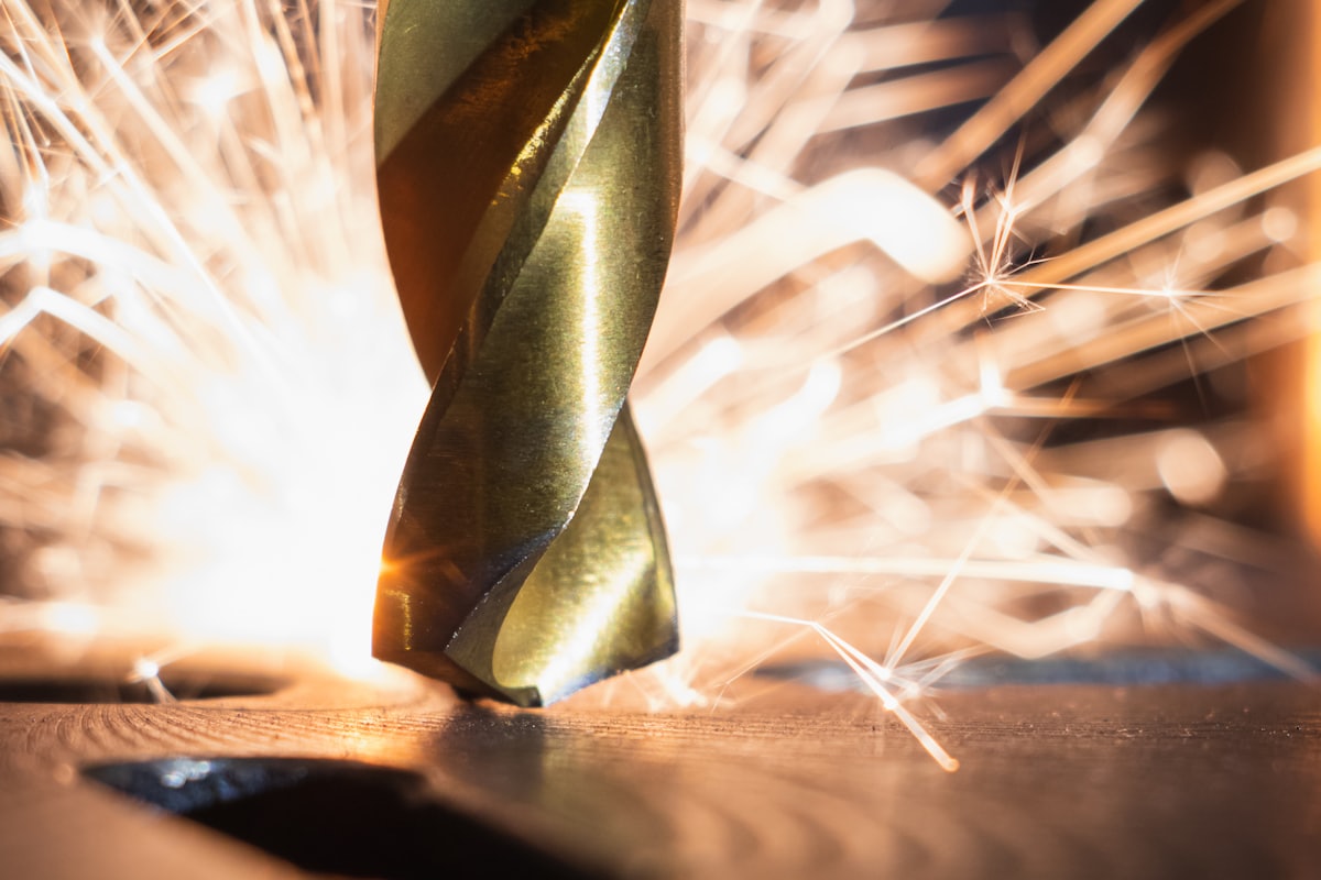 Cutting tool machining a metal component in a machine shop