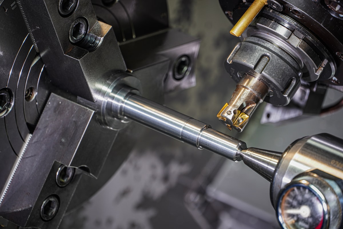 Shaft journal being machined to size on a lathe